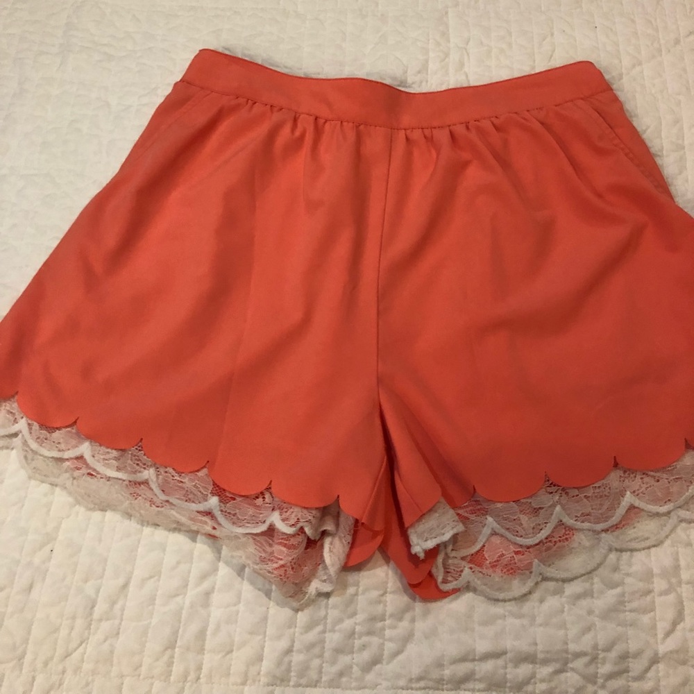 Orange shorts with pockets & lace detail